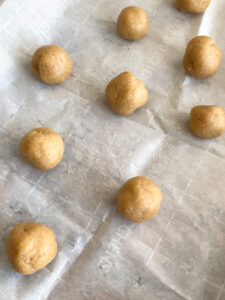 These Almond Butter Thumbprint Cookies are an almondy version of the classic peanut butter blossom cookies. They are made with some healthier ingredients, making them a great addition to your Christmas cookie lineup!